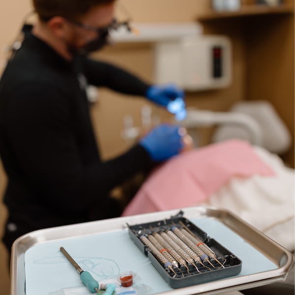 Luverne local dentist performing dental extraction at the office