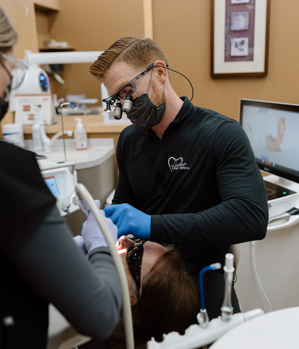 Luverne Dental team is working with a happy patient in a dental chair