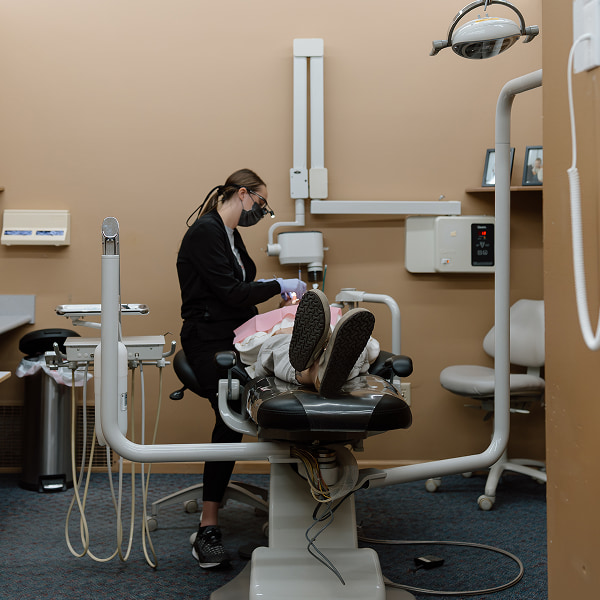 Local Luverne dentist with a patient in a dental chair