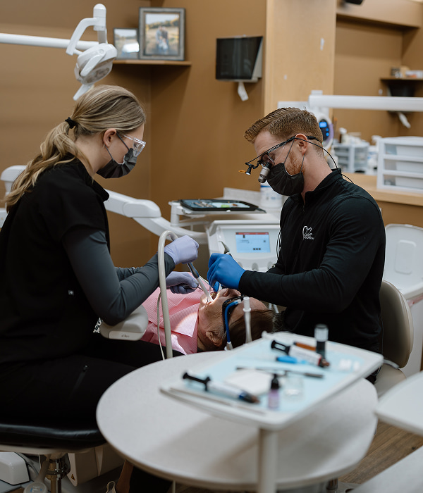 Luverne Dental team is working with a happy patient in a dental chair