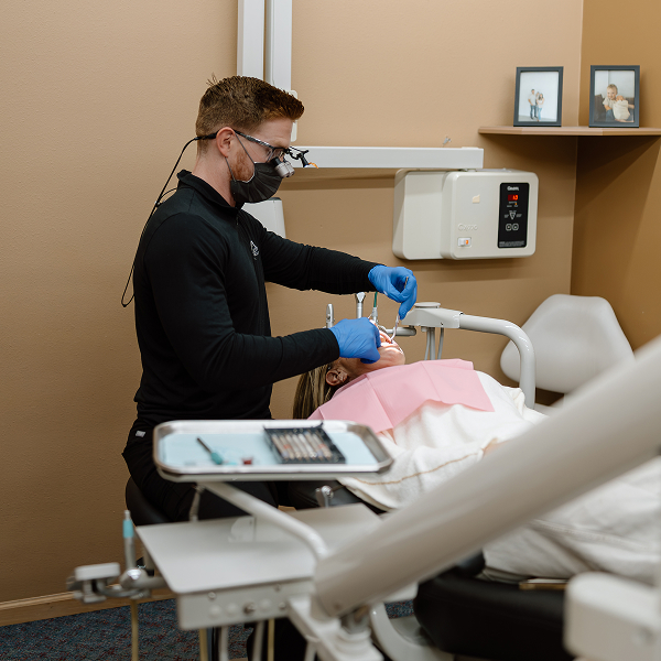 Luverne local dentist performing dental extraction at the office